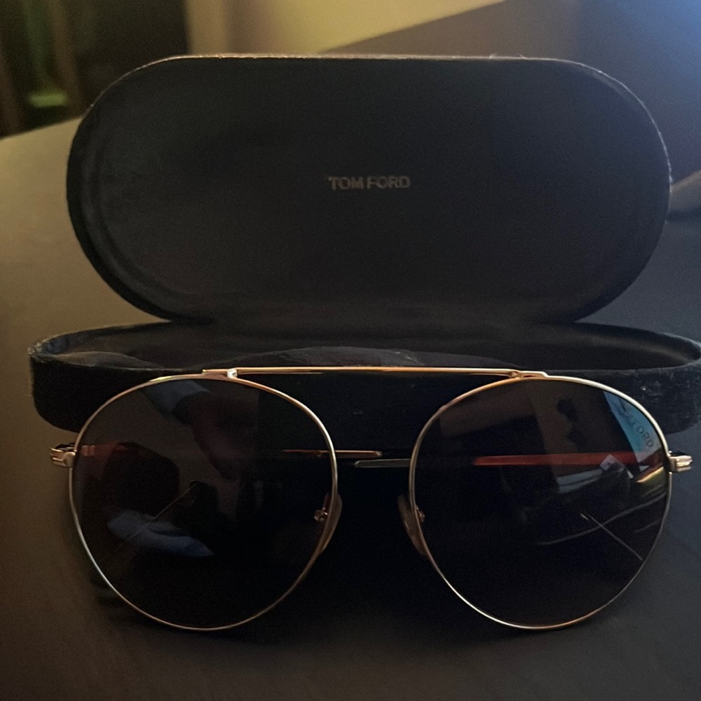 Never worn, case included